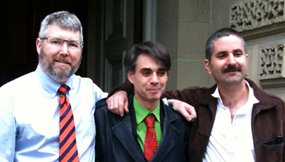 Matthew Mernagh (centre) exits Ontario's Court of Appeal after conclusion of hearings, May 8, 2012. Left: Freedom Party of Ontario Leader Paul McKeever. Right: Mernagh's Lawyer Paul Lewin.